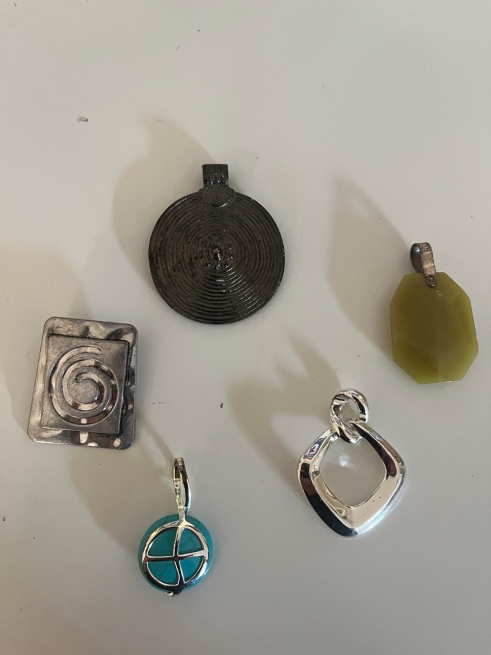 Pendants you get all five. Each unique and beautiful.